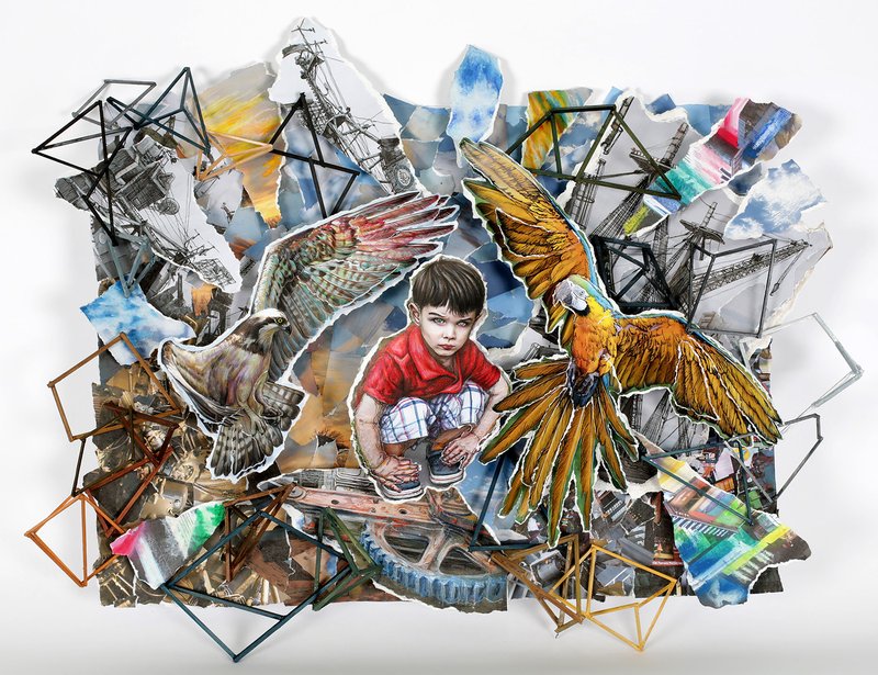 Mixed media collage sculpture of a young boy in a red shirt crouching beside a large colorful macaw parrot, surrounded by layered cut-out fragments of ships, industrial machinery, birds of prey, geometric wire frames, and painted sky elements in a dynamic scattered wall-mounted composition.