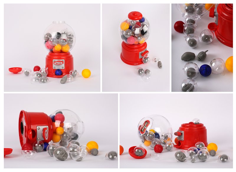 Five-view product photography of a red miniature gumball machine with colorful balls including clear capsules, metallic spheres, and solid colored gumballs, shown upright and tipped over with contents spilled across a white surface.