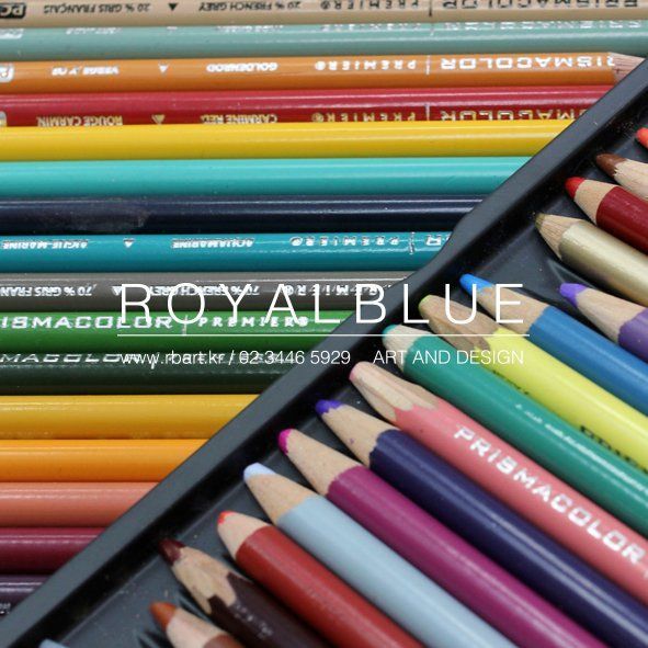 A Royal Blue branded promotional image showing a close-up of colorful pencils arranged together, with the studio logo and website overlay in white text