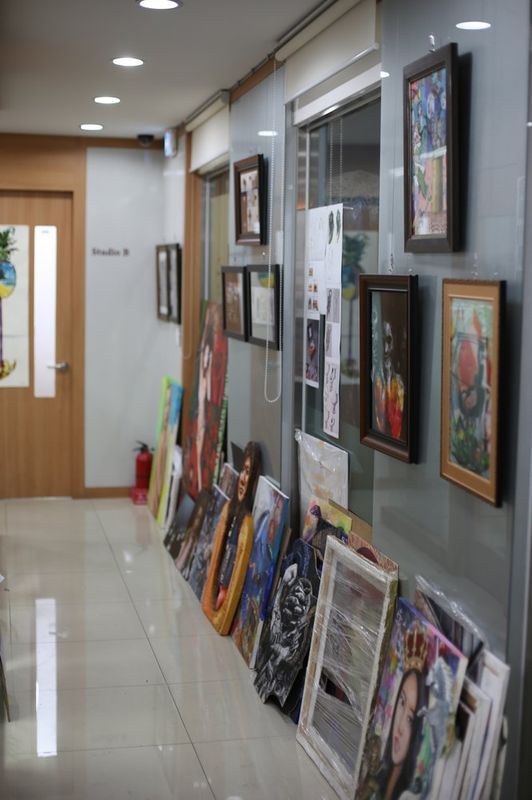 Student artwork displayed in Royal Blue Art & Design studio hallway, Apgujeong Seoul
